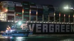 Suez Canal: Effort to refloat wedged container ship continues
