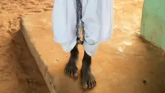 ученик в кандалах