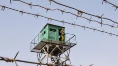 Күзөттө турган аскер