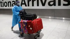 Voyageur à Heathrow