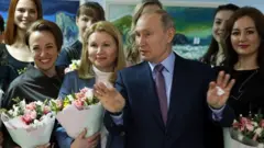 Путин