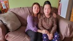 Youa Vang Lee with daughter Shoua
