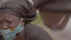 Mwanamke aliyevalia barakoa