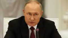 Путін