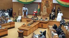 Ghana's President John Dramani Mahama (C, L) delivers his State of the Nation address at the Parliament on February 25, 2014 in Accra, Ghana.