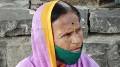 మహిళ