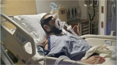 The man in a hospital bed