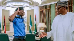 Ọga ọlọpaa ati Aarẹ Muhammadu Buhari