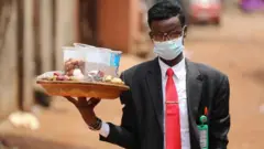 Kolanut seller