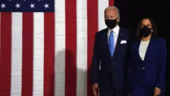 Democratic presidential nominee Joe Biden and vice presidential running mate, Kamala Harris, arrive to conduct their first press conference