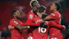 Manchester United players celebrate