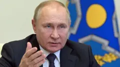 путін