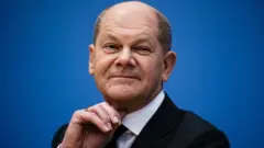 Designated Chancellor Olaf Scholz attends a press conference after the signing of the coalition agreement of Social Democratic Party (SPD), Green party (Die Gruenen) and Free Democratic Party (FDP) in Berlin, Germany, 07 December 2021