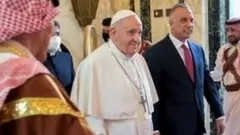 The Pope was greeted by Iraq's PM and dancers at the airport in Baghdad