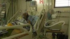 ቬንቲሌተር ላይ ያለ ህመምተኛ