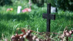 Adam's unmarked grave in London