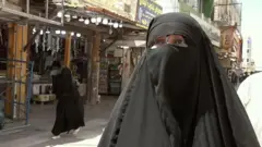 زوجة أحد الضحايا