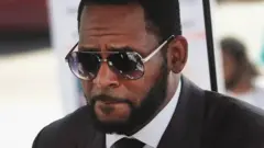 R. Kelly arriving at a court hearing in 2019