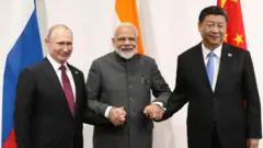 জাপানে ভ্লাদিমির পুতিন, নরেন্দ্র মোদী ও শি জিনপিং। জুন, ২০১৯