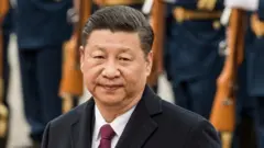 Xi