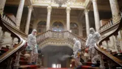 Workers disinfect Dolmabahce Palace in Istanbul