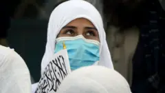 Afghan schoolgirl with flag