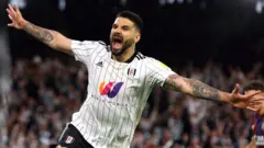 Aleksandar Mitrovic of Fulham celebrates scoring their side's seventh goal during the Sky Bet Championship match between Fulham and Luton Town at Craven Cottage on May 02, 2022