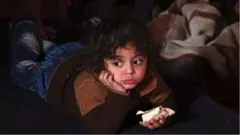 طفلة