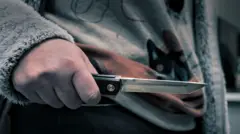 Человек с ножом