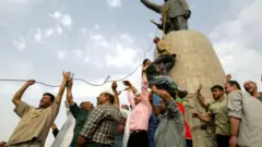 Statue of Saddam Hussein pulled down in April 2003