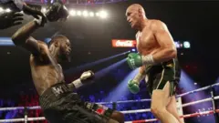 Tyson Fury ati Deontay Wilder