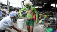 A street performer called Tanzania Joker has been raising awareness among his compatriots