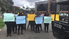 Women hold placard wit message say make police stop killing for port-harcourt