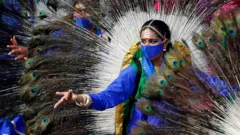 Dancers perform during a dress rehearsal for the Republic Day parade in New Delhi, India, on 23 January 2021