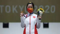 China don win di first Olympic Gold medal