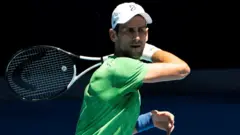 Novak Djokovic of Serbia takes part in a practice session ahead of the Australian Open tennis tournament in Melbourne on January 13, 2022.