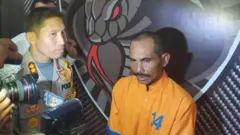 Tersangka pelaku pembunuhan Hori (43) memberikan keterangan kepada wartawan di Polres Lumajang, Selasa (12/06).