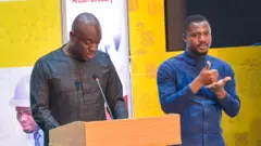 Mahamadu Bawumia and im sign interpreter