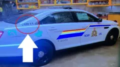 Police car believed to have been used by a gunman
