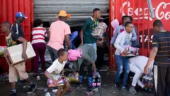 Scène de pillage en Afrique du Sud