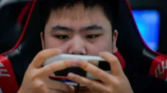 A Rogue Warriors esports team member trains for the game "Arena of Valor" at his club in Shanghai, China September 3, 2021. Picture taken September 3, 2021. REUTERS/Aly Song