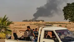 Resulayn'dan gelen fotoğraflarda bölgede dumanların yükseldiği görülüyor