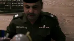 पुलिस अधिकारी मेजर अज़ीज़