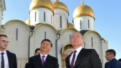 Xi Jinping and Vladimir Putin at the Kremlin