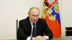 Путин