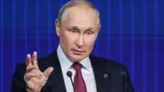 Путин