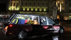 The Queen's coffin arrives at Buckingham Palace