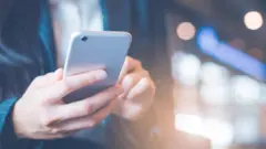 Man looking at mobile phone