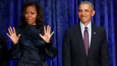 Michelle Obama and Barack Obama