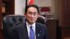 Former Japanese Foreign Minister Fumio Kishida poses for a picture following a press conference at the Liberal Democratic Party (LPD) headquarters after he was elected as the party president in Tokyo, Japan September 29, 2021